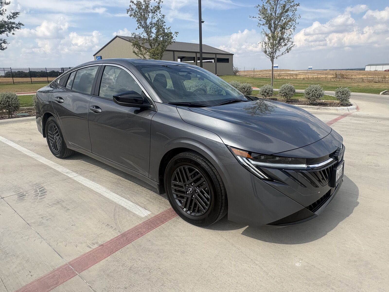 Gray 2026 Nissan Sentra sedan available to rent in Granbury and Glen Rose, TX
